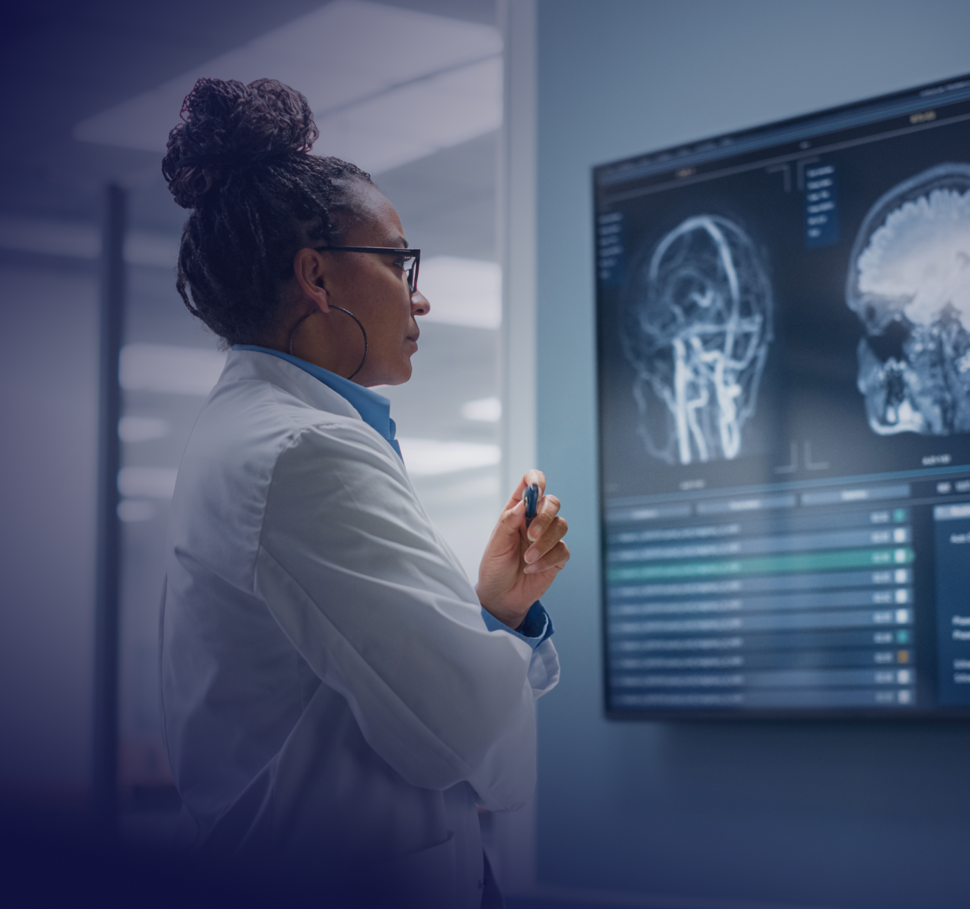 healthcare worker looking at scan