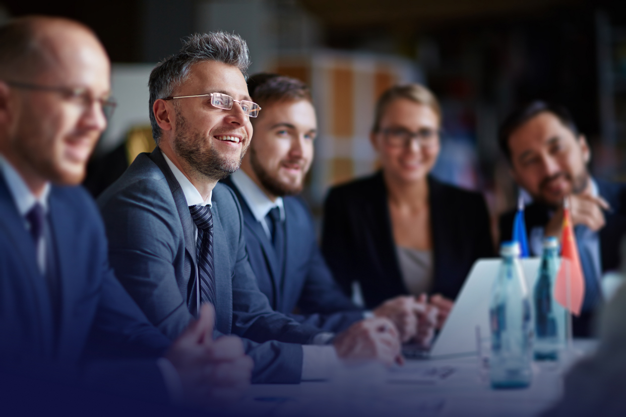 Professional workers at a conference room table