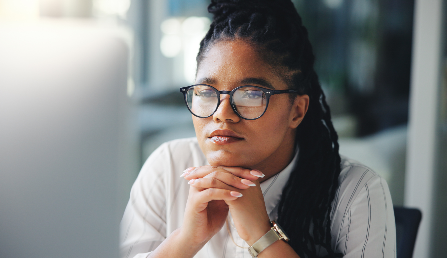 office worker looking at laptop