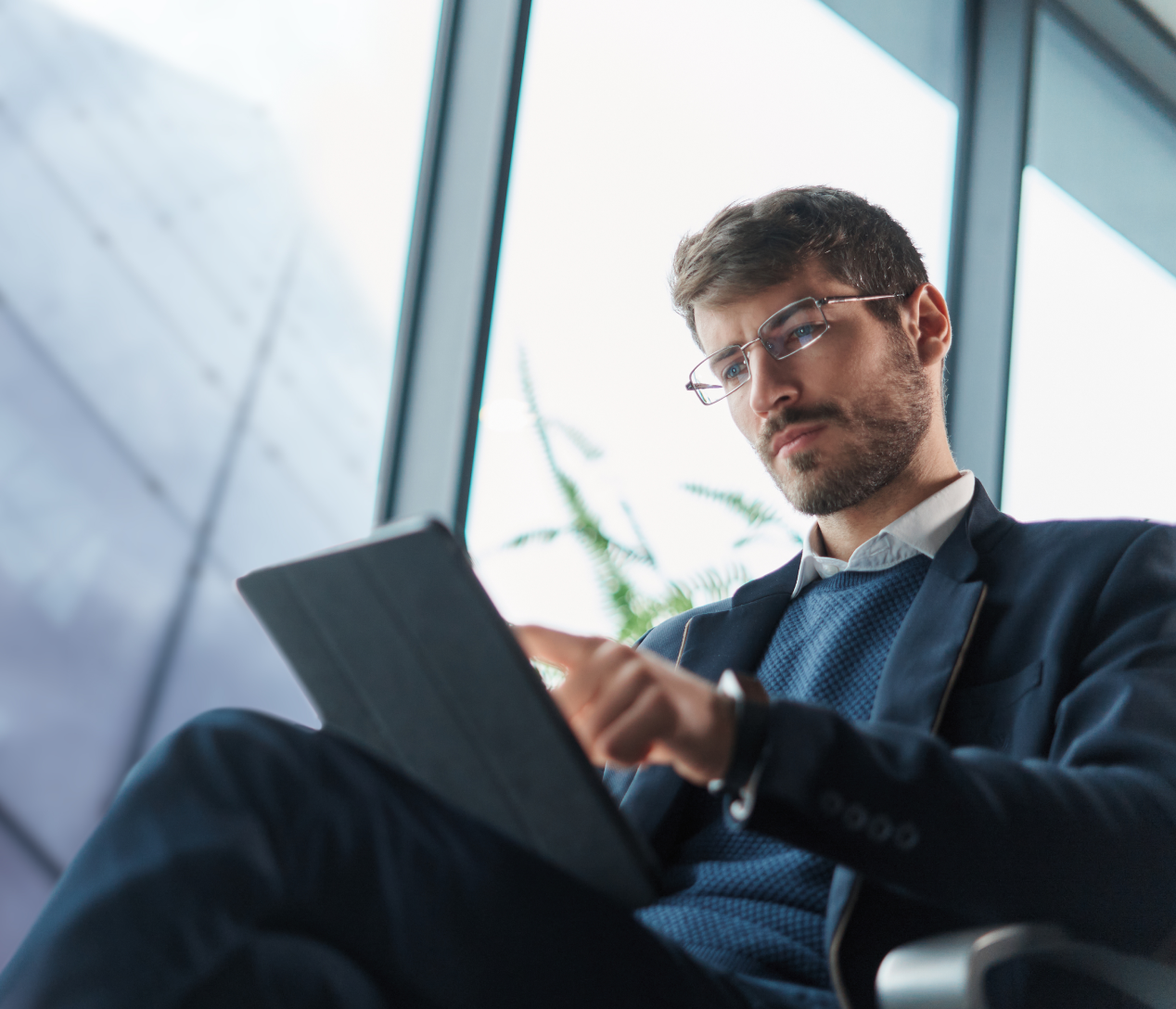 business professional looking at tablet