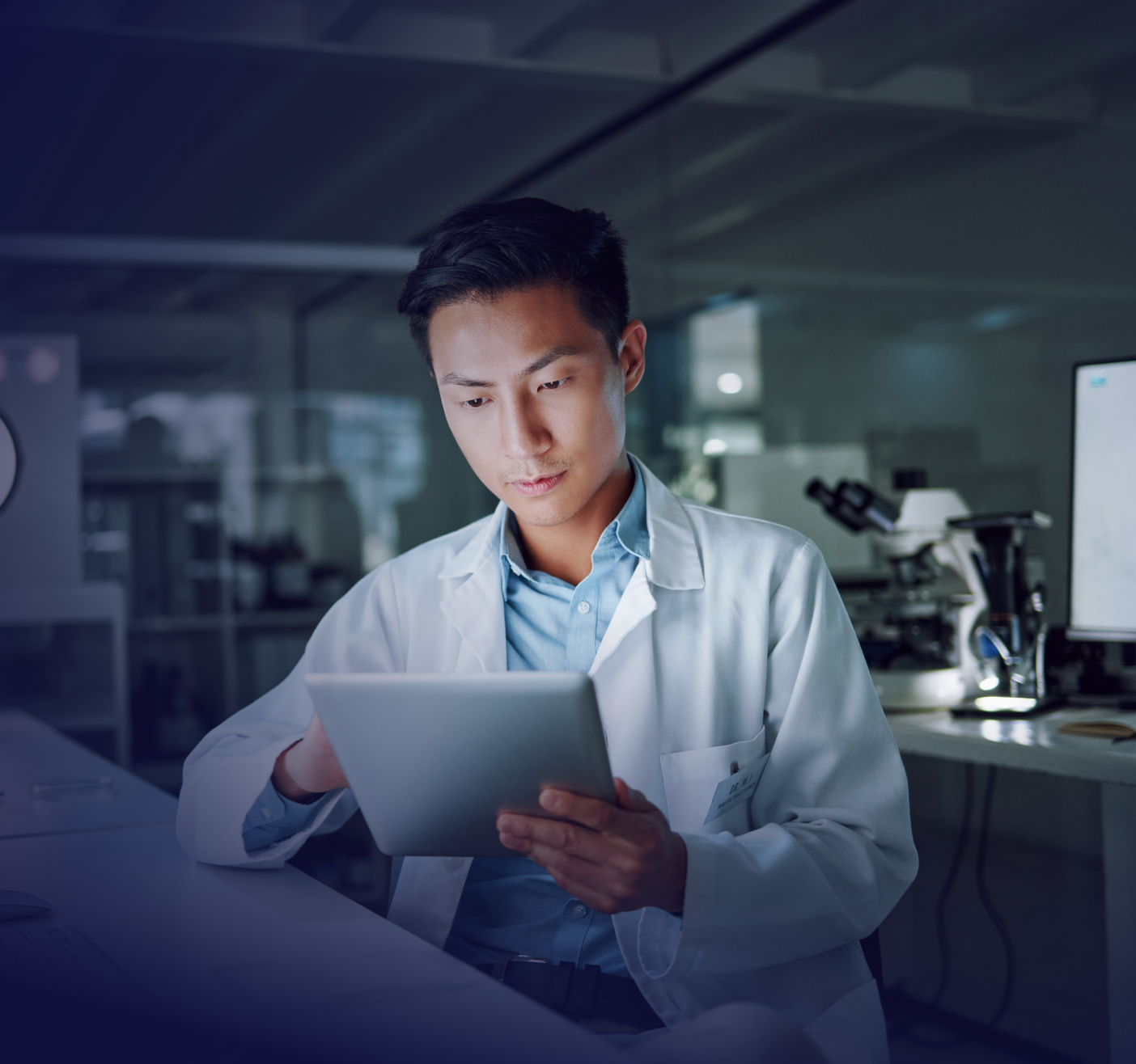 healthcare worker looking at tablet