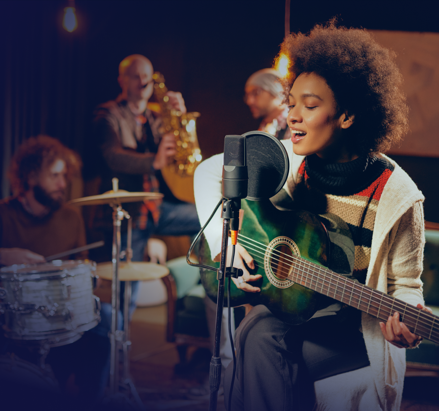 musician recording with band