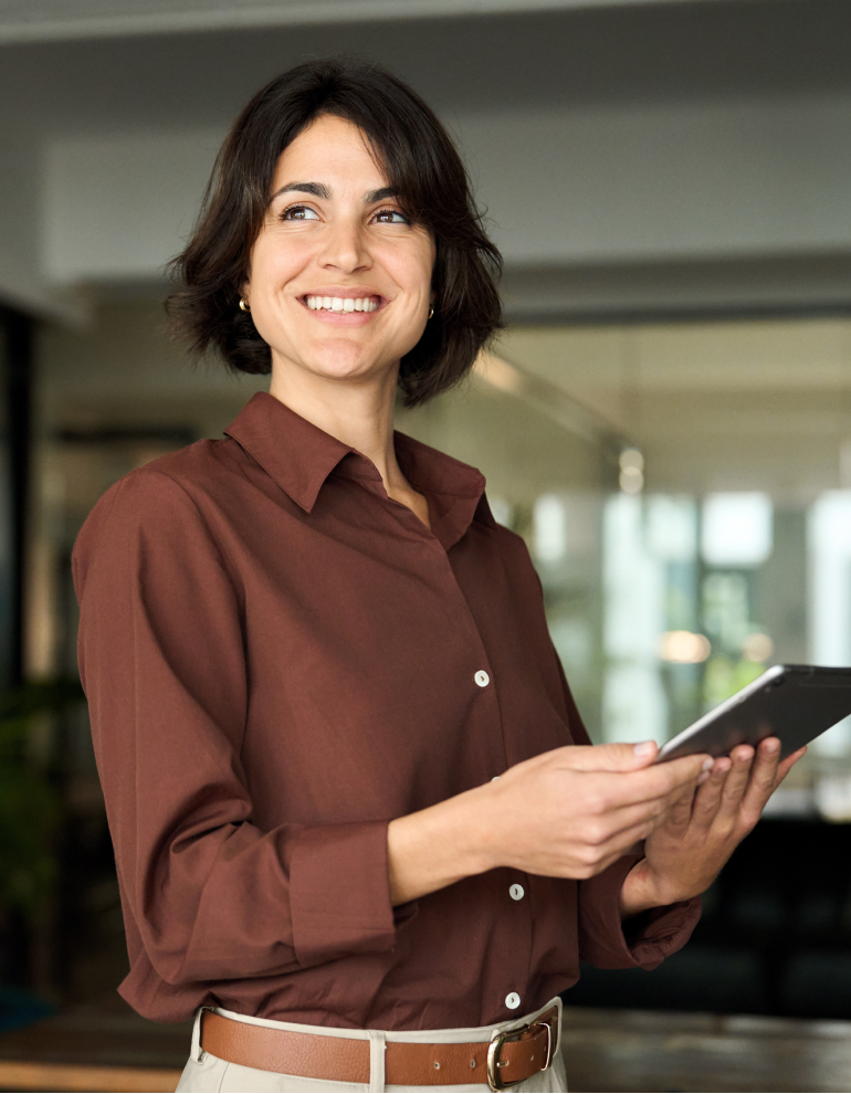 professional smiling holding tablet