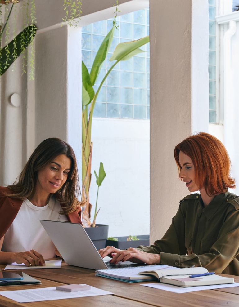 office workers at desk together