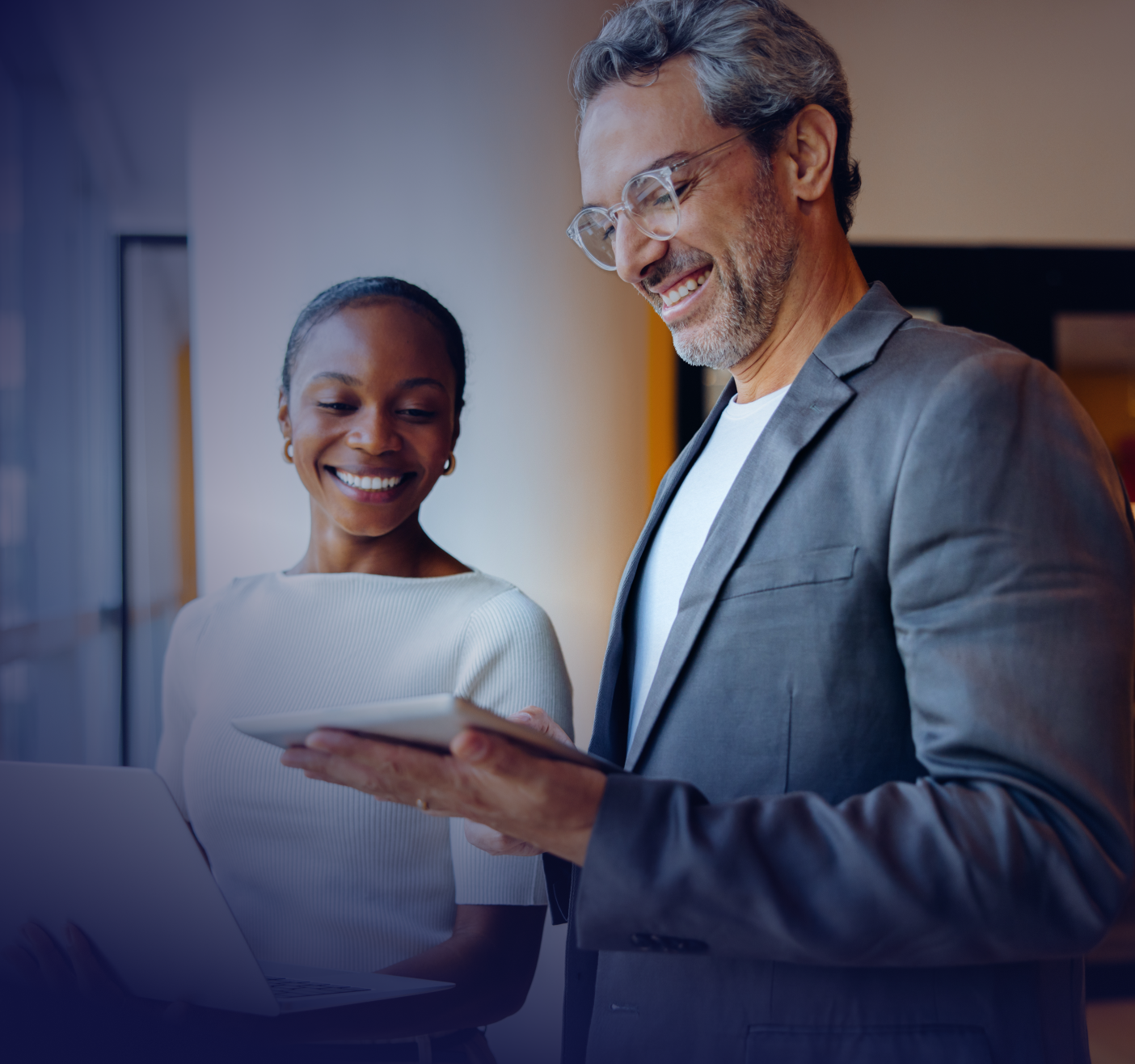 office workers looking at tablet