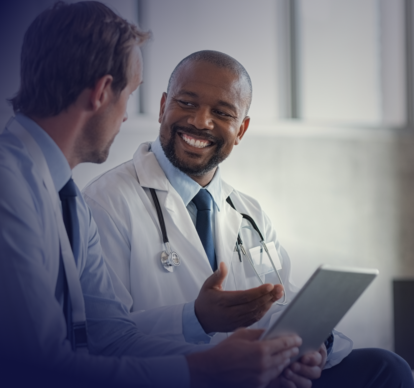 healthcare workers speaking to each other