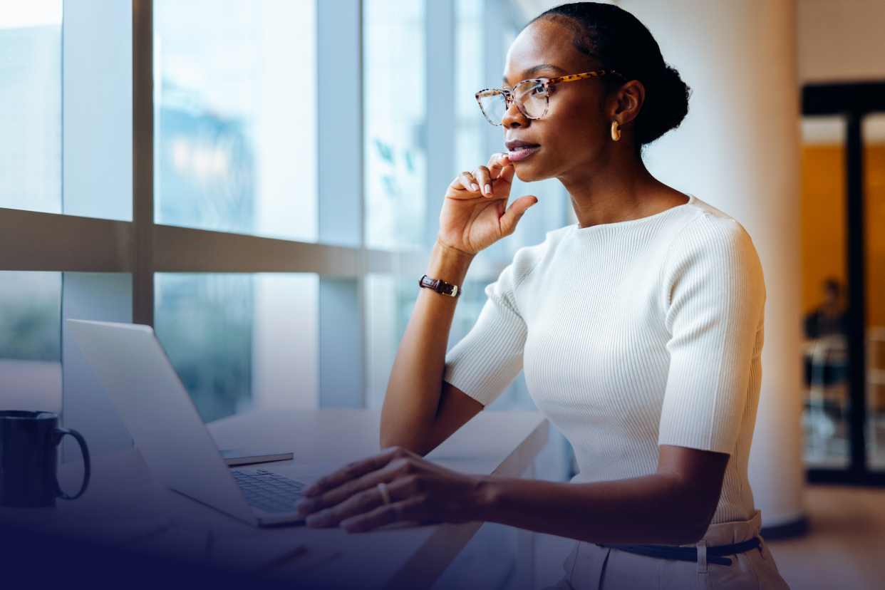 Woman looking at laptop