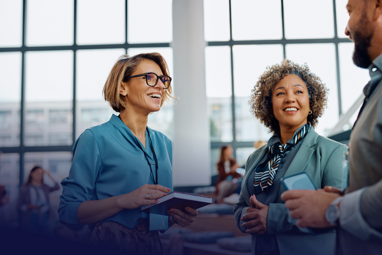 women speaking in office