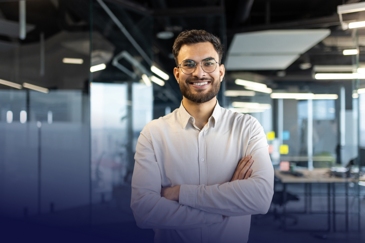 Office worker smiling in office