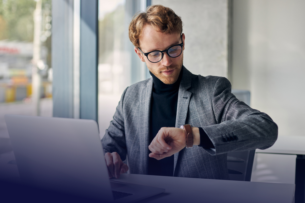 Worker looking at watch