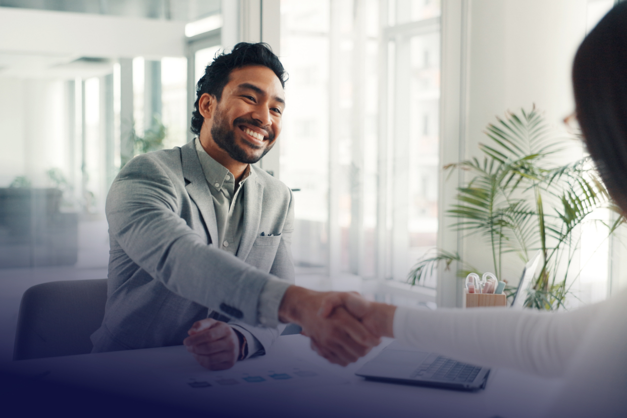 Professional workers shaking hands