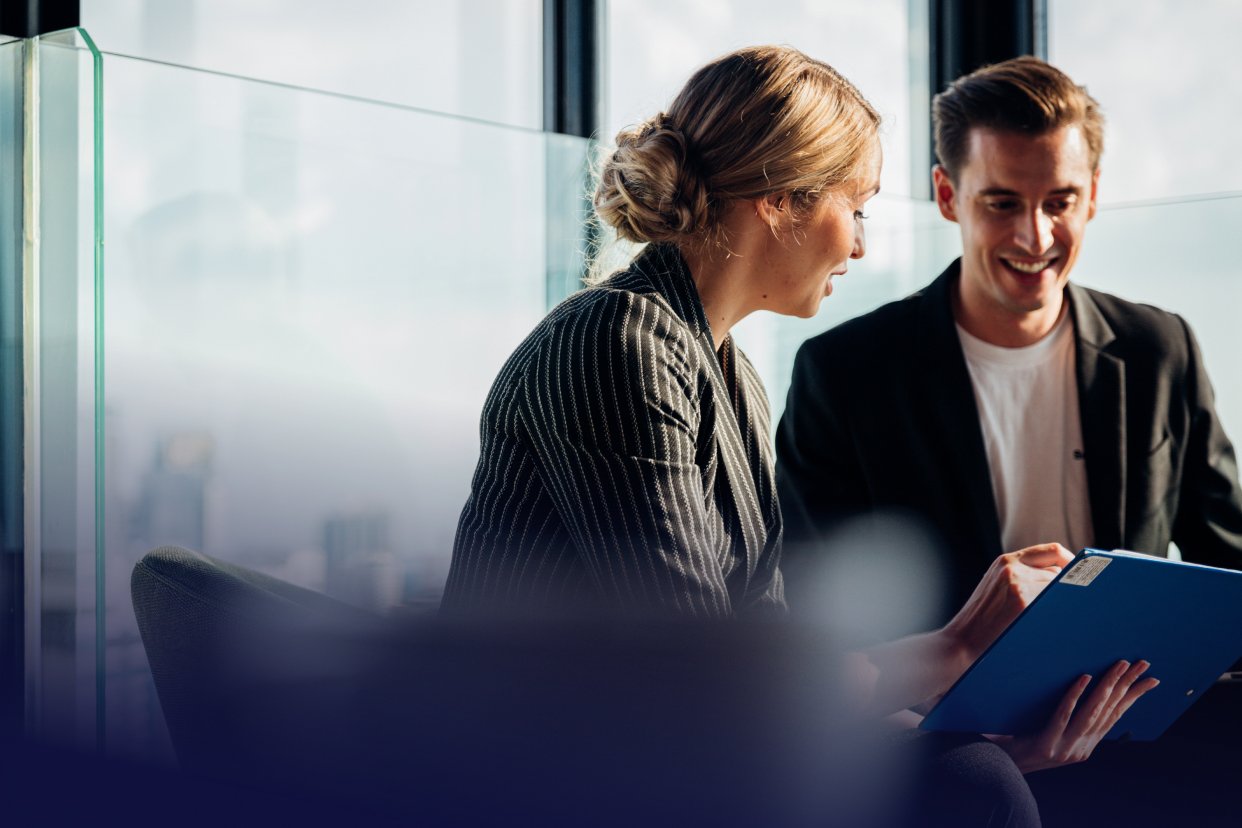 Workers in the office talking