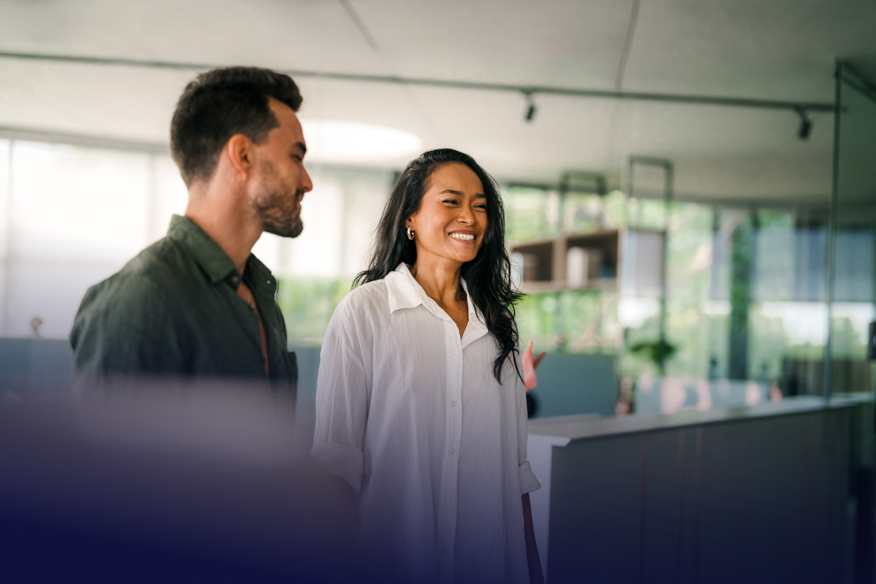 coworkers smiling in office