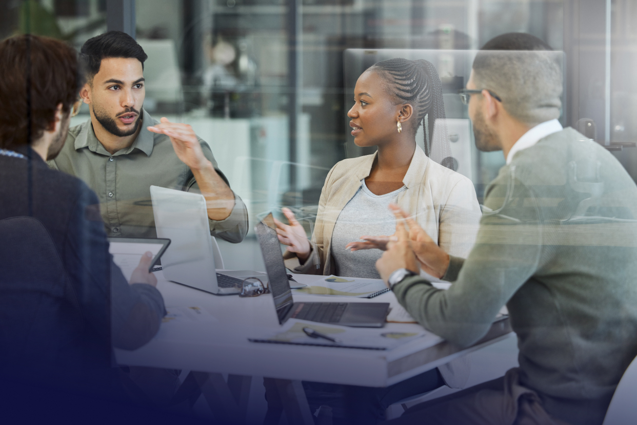 Office workers at a meeting in a conference room
